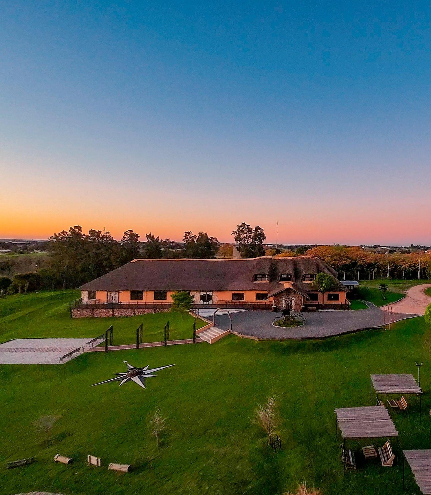 Panoramic view of the event venue estate at sunset